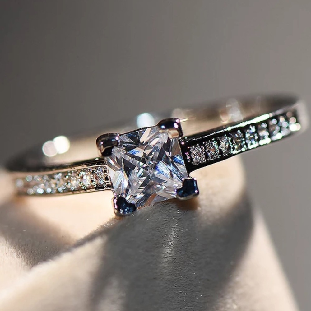 Princess cut sterling silver engagement ring